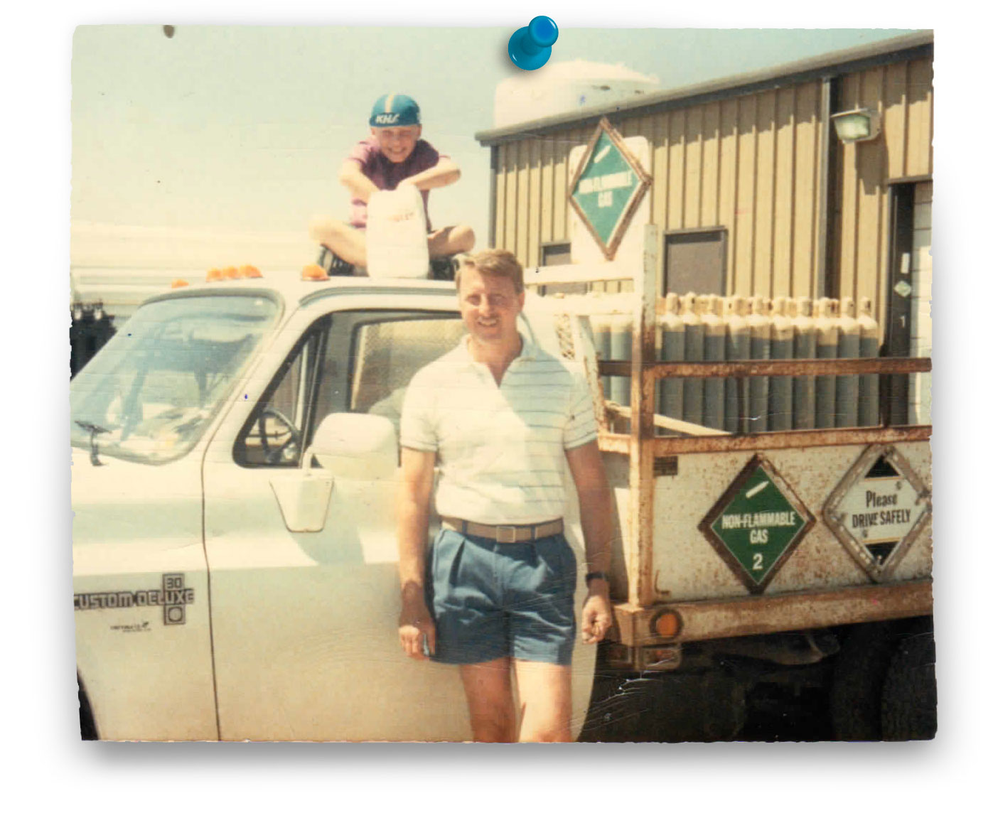 tex-air gas leaders jim and joe prowell stand in front of helium truck in 1980s